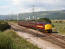 37421 passes Margam with a Fishguard to Rhymney service